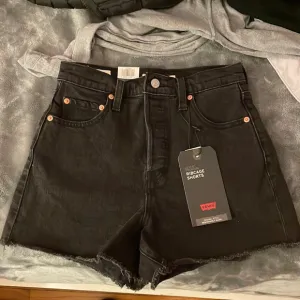 Size 26 Levi’s ribcage shorts. Super high rise. Never worn new with tags